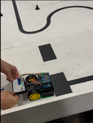 Line-tracking robot built with custom hardware and 3D-printed chassis.